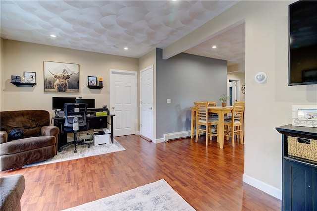 73 Fessenden St, Warwick, RI 02886 - living room with wood finished floors, a desk, and recessed lighting