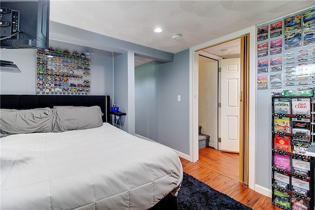 73 Fessenden St, Warwick, RI 02886 - bedroom featuring wood finished floors and recessed lighting