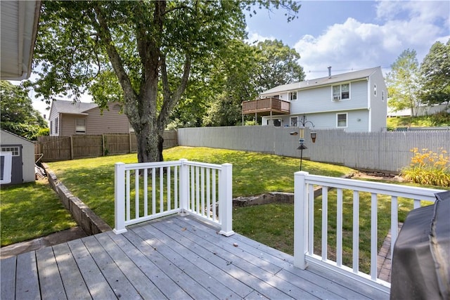 73 Fessenden St, Warwick, RI 02886 - deck featuring a fenced backyard, a grill, and a storage unit