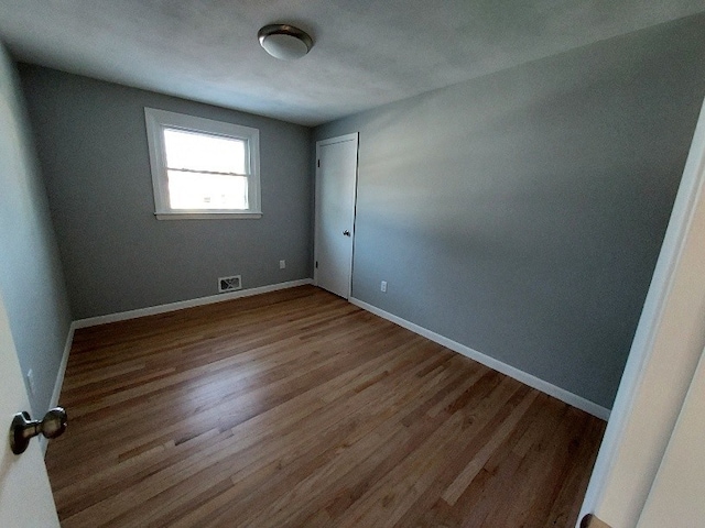 16 Fyffe Ave, Cranston, RI 02920 - spare room featuring wood finished floors