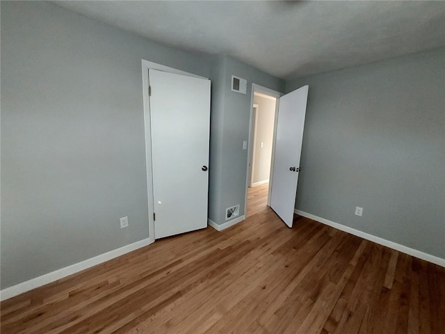 16 Fyffe Ave, Cranston, RI 02920 - unfurnished bedroom featuring baseboards and wood finished floors