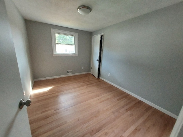 16 Fyffe Ave, Cranston, RI 02920 - spare room featuring light wood-style floors and baseboards