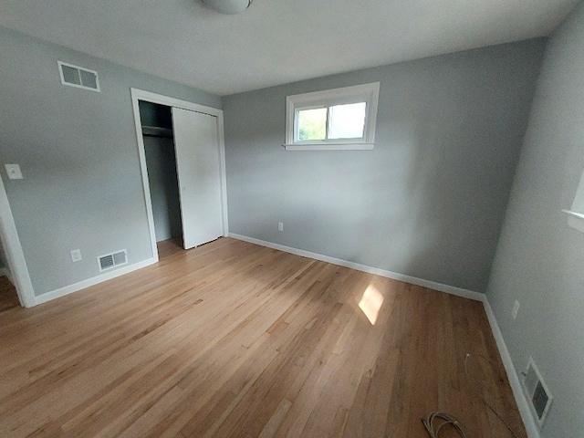 16 Fyffe Ave, Cranston, RI 02920 - unfurnished bedroom featuring light wood-style flooring and a closet