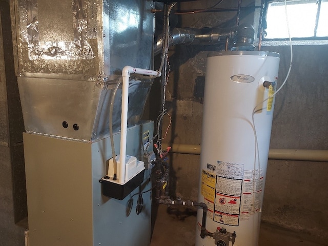16 Fyffe Ave, Cranston, RI 02920 - utility room featuring water heater and heating unit