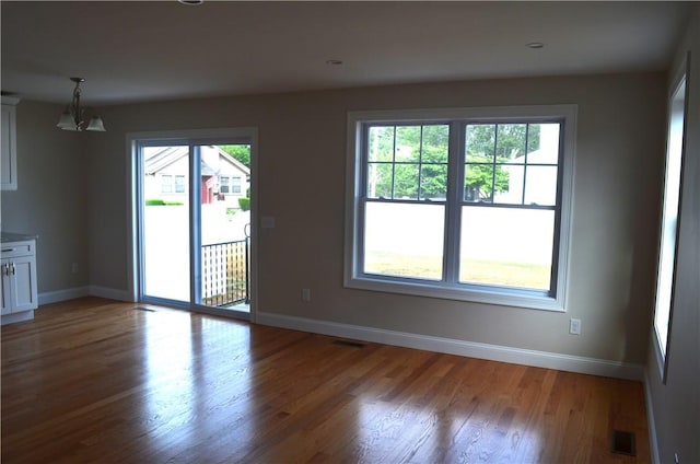 68 Greene St Unit 5, Warwick, RI 02886 - unfurnished room featuring wood finished floors