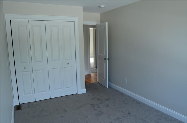 68 Greene St Unit 5, Warwick, RI 02886 - unfurnished bedroom with a closet and carpet