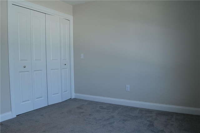 68 Greene St Unit 5, Warwick, RI 02886 - unfurnished bedroom featuring carpet flooring and a closet