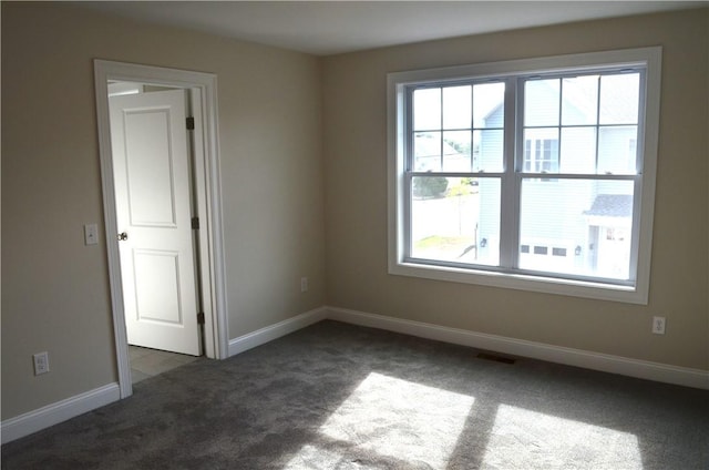 68 Greene St Unit 5, Warwick, RI 02886 - empty room with carpet floors and baseboards