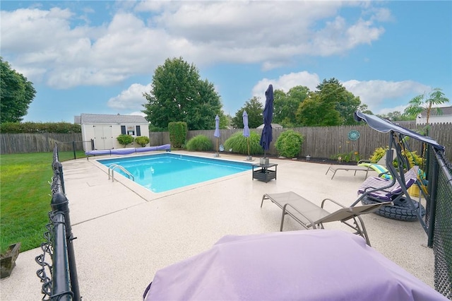 14 Willow Dr, Cranston, RI 02920 - view of swimming pool featuring a fenced backyard, a patio, and a storage unit