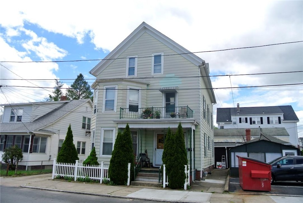 18 Standish Ave, Cranston, RI 02920 - view of front of house featuring a balcony and covered porch