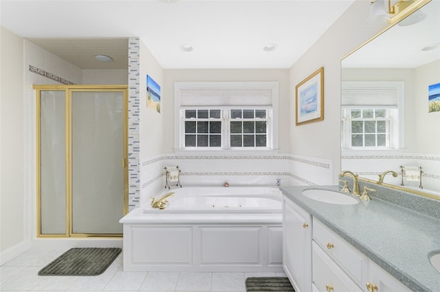 32 Susan Dr, Cumberland, RI 02864 - full bath with a stall shower, a jetted tub, double vanity, and tile patterned flooring