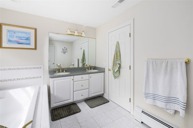 32 Susan Dr, Cumberland, RI 02864 - full bath with a baseboard heating unit, double vanity, a garden tub, and tile patterned flooring