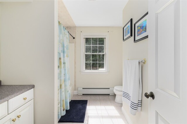 32 Susan Dr, Cumberland, RI 02864 - full bath with baseboard heating, tile patterned floors, vanity, and curtained shower