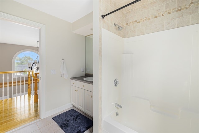 32 Susan Dr, Cumberland, RI 02864 - bathroom with vanity, tile patterned floors, and washtub / shower combination