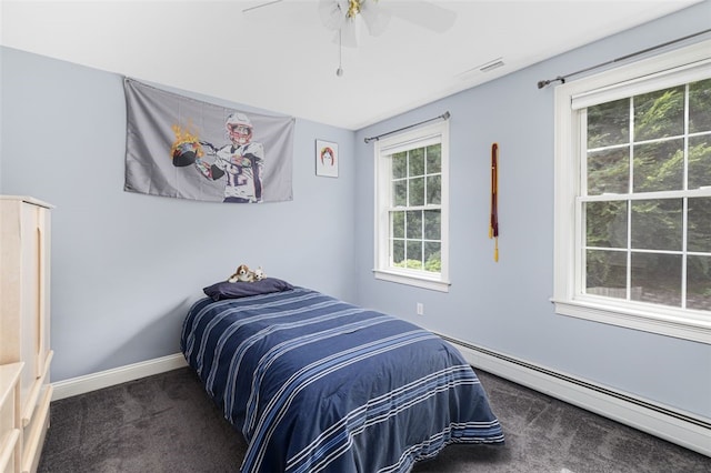 32 Susan Dr, Cumberland, RI 02864 - carpeted bedroom with baseboard heating and ceiling fan