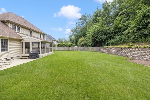 32 Susan Dr, Cumberland, RI 02864 - fenced yard with a patio area and a sunroom