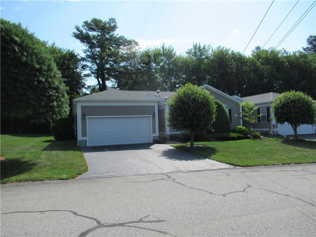 73 Orchard Meadows Dr Unit 73, Smithfield, RI 02917 - view of front of house with a front lawn, asphalt driveway, and an attached garage