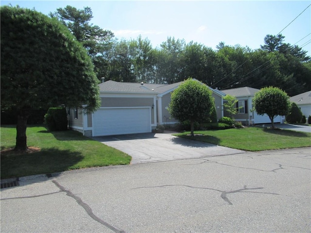 73 Orchard Meadows Dr Unit 73, Smithfield, RI 02917 - view of front of home featuring a garage, a front yard, and driveway