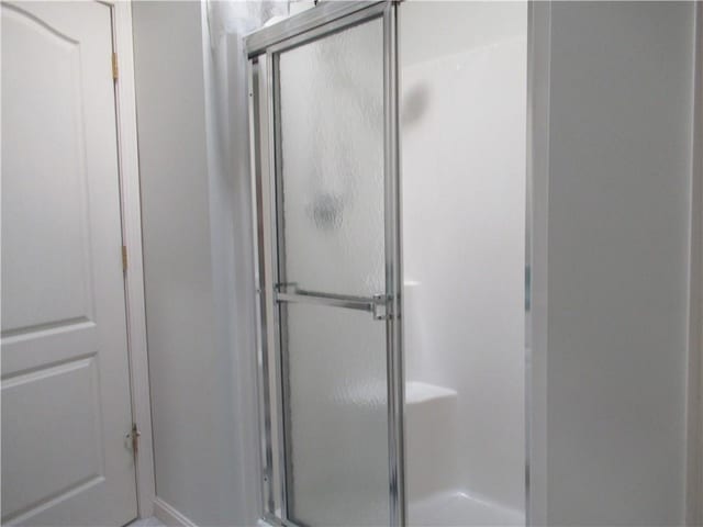 73 Orchard Meadows Dr Unit 73, Smithfield, RI 02917 - bathroom with a stall shower and baseboards