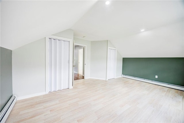 15 Wendell St, Providence, RI 02909 - bonus room with a baseboard heating unit, vaulted ceiling, and light wood-style flooring