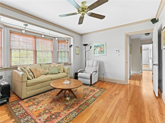 173 Gaskill St, Woonsocket, RI 02895 - living room with a ceiling fan, light wood-type flooring, and ornamental molding