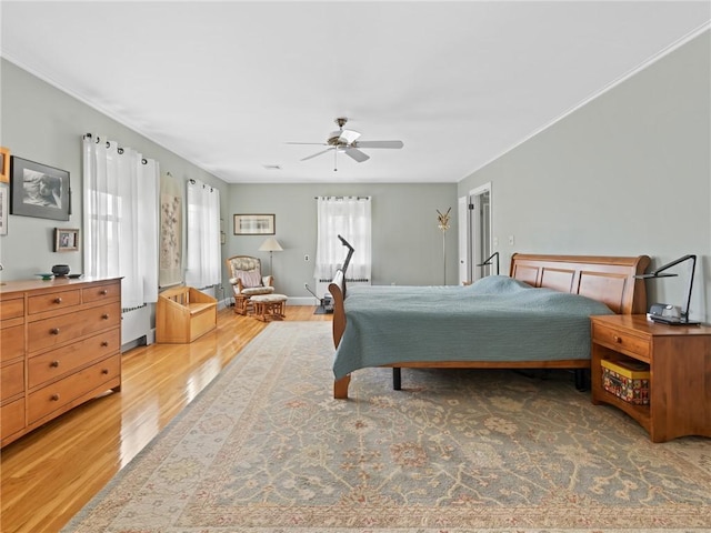 173 Gaskill St, Woonsocket, RI 02895 - bedroom with light wood-style floors and a ceiling fan