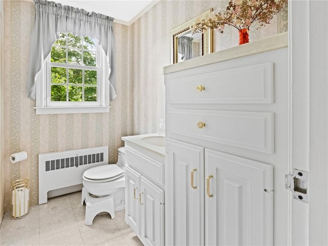 173 Gaskill St, Woonsocket, RI 02895 - bathroom featuring radiator heating unit, wallpapered walls, tile patterned flooring, and vanity