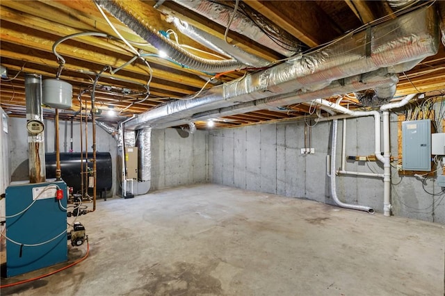 1 Lisi Ln Unit 1, Providence, RI 02904 - unfinished below grade area with electric panel, oil tank, heating unit, and a heating unit