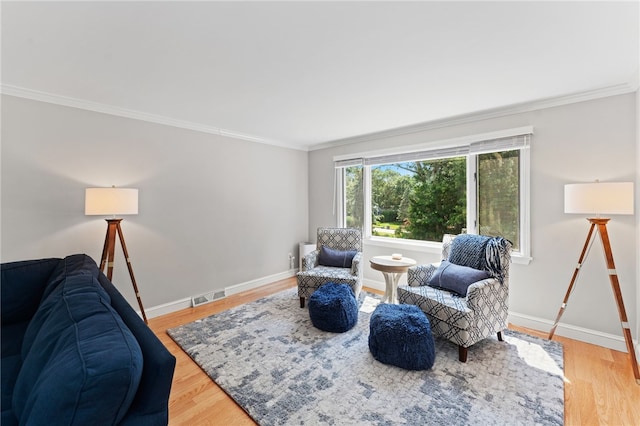 85 N Cobble Hill Rd, Warwick, RI 02886 - living area featuring ornamental molding and light wood-type flooring