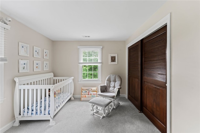 85 N Cobble Hill Rd, Warwick, RI 02886 - bedroom with carpet floors, a closet, and a crib