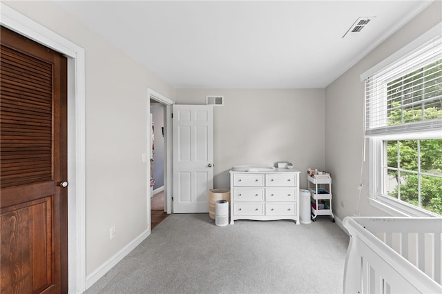 85 N Cobble Hill Rd, Warwick, RI 02886 - bedroom featuring multiple windows and light carpet
