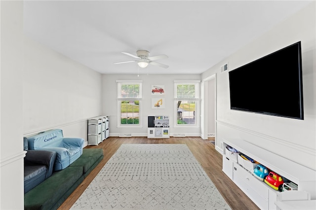 85 N Cobble Hill Rd, Warwick, RI 02886 - living room with wood finished floors and ceiling fan