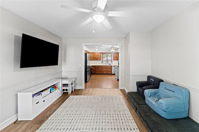 85 N Cobble Hill Rd, Warwick, RI 02886 - living room featuring wood finished floors and a ceiling fan