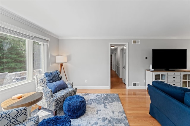 85 N Cobble Hill Rd, Warwick, RI 02886 - living area featuring light wood-style floors and crown molding