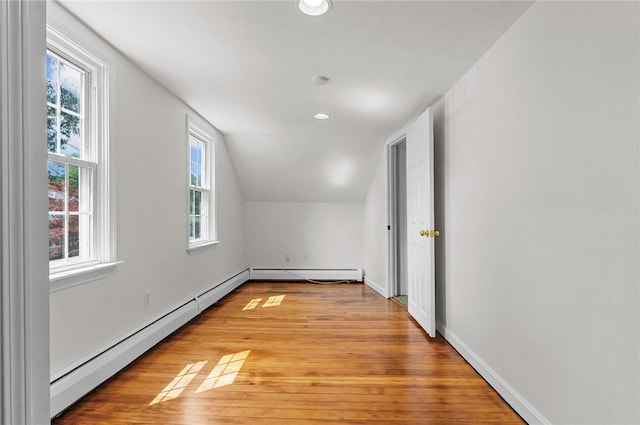 188 Reynolds Ave, Warwick, RI 02889 - bonus room featuring baseboard heating, light wood-type flooring, vaulted ceiling, and recessed lighting
