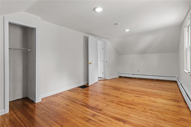 188 Reynolds Ave, Warwick, RI 02889 - bonus room with lofted ceiling, a baseboard heating unit, recessed lighting, and wood finished floors