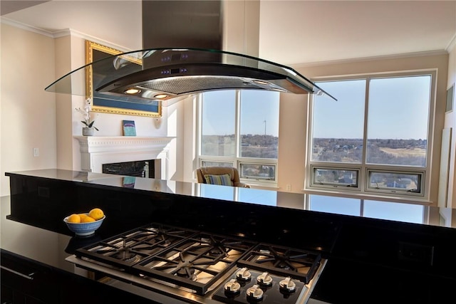 1 Tower Dr Unit 1802, Portsmouth, RI 02871 - kitchen featuring island range hood, stainless steel cooktop, a fireplace, and crown molding