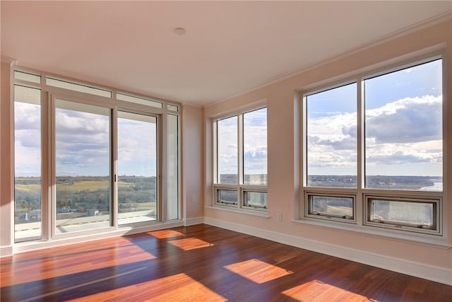 1 Tower Dr Unit 1802, Portsmouth, RI 02871 - unfurnished sunroom featuring wood finished floors and ornamental molding