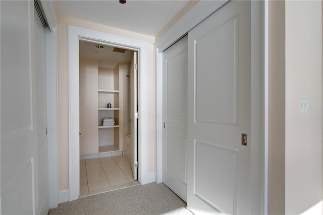 1 Tower Dr Unit 1802, Portsmouth, RI 02871 - hallway featuring light tile patterned floors and light carpet