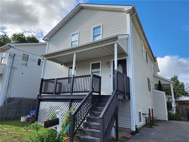 93 Dixon St Unit 1Front, Providence, RI 02907 - back of property featuring covered porch and stairway