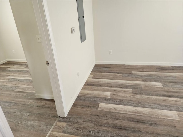 93 Dixon St Unit 1Front, Providence, RI 02907 - empty room with wood finished floors and electric panel