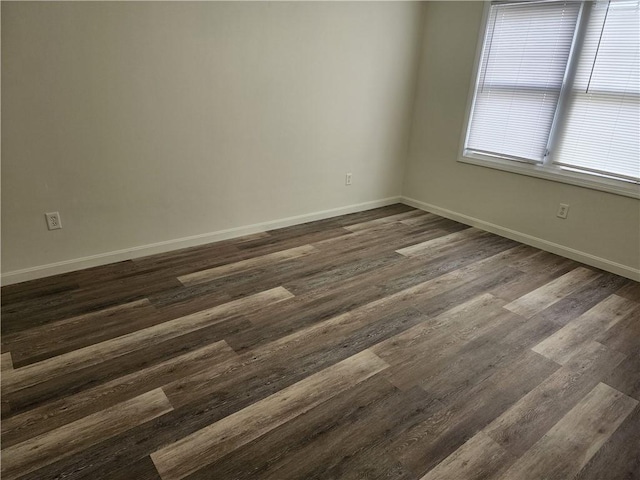 93 Dixon St Unit 1Front, Providence, RI 02907 - spare room featuring baseboards and dark wood-style floors