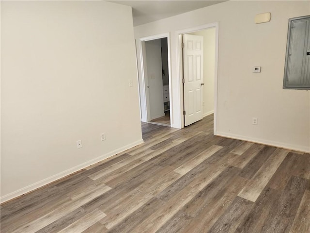 93 Dixon St Unit 1Front, Providence, RI 02907 - empty room featuring wood finished floors and electric panel
