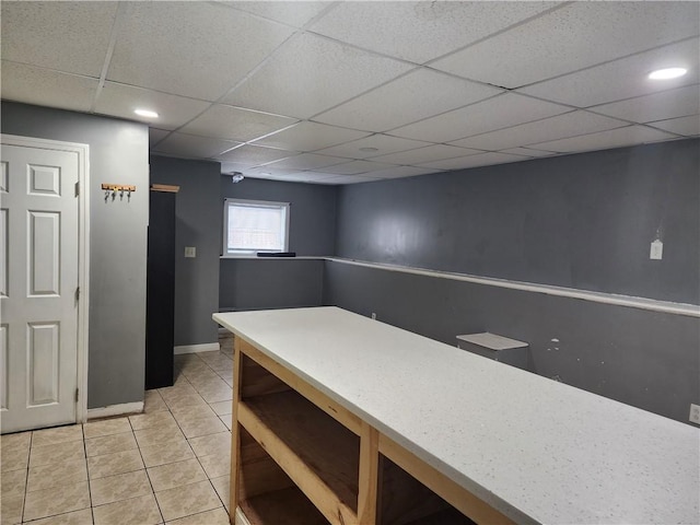 93 Dixon St Unit 1Front, Providence, RI 02907 - kitchen with light tile patterned flooring, a drop ceiling, recessed lighting, and light countertops