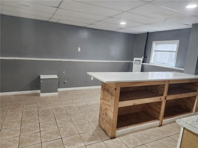 93 Dixon St Unit 1Front, Providence, RI 02907 - kitchen featuring light tile patterned floors and a drop ceiling