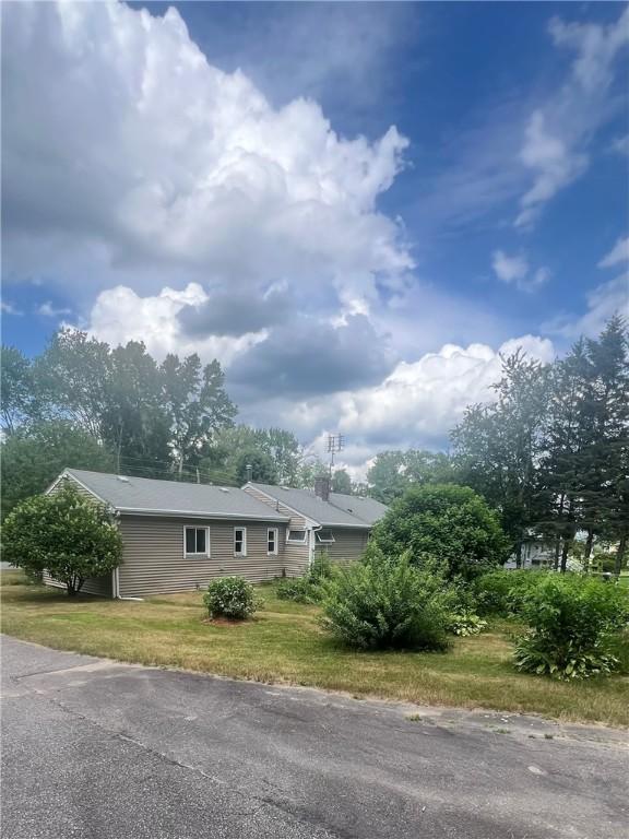 354 Rhodes Ave, Woonsocket, RI 02895 - view of front of property featuring a front yard