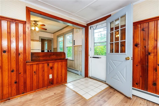 3442 Flat River Rd, Coventry, RI 02816 - entryway featuring wallpapered walls, a baseboard radiator, light wood-style floors, crown molding, and ceiling fan