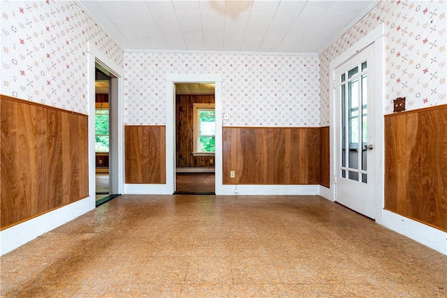 3442 Flat River Rd, Coventry, RI 02816 - spare room featuring a wainscoted wall, wallpapered walls, tile patterned floors, a baseboard radiator, and wooden walls