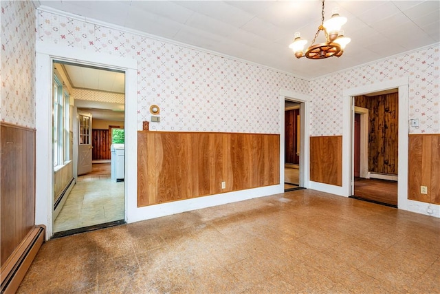 3442 Flat River Rd, Coventry, RI 02816 - unfurnished room with wallpapered walls, baseboard heating, a wainscoted wall, a chandelier, and crown molding