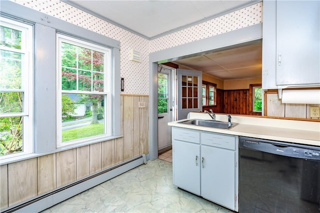 3442 Flat River Rd, Coventry, RI 02816 - kitchen with dishwasher, a baseboard radiator, light countertops, light marble finish flooring, and wooden walls